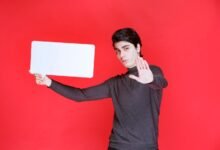 a guy showing blocking sign